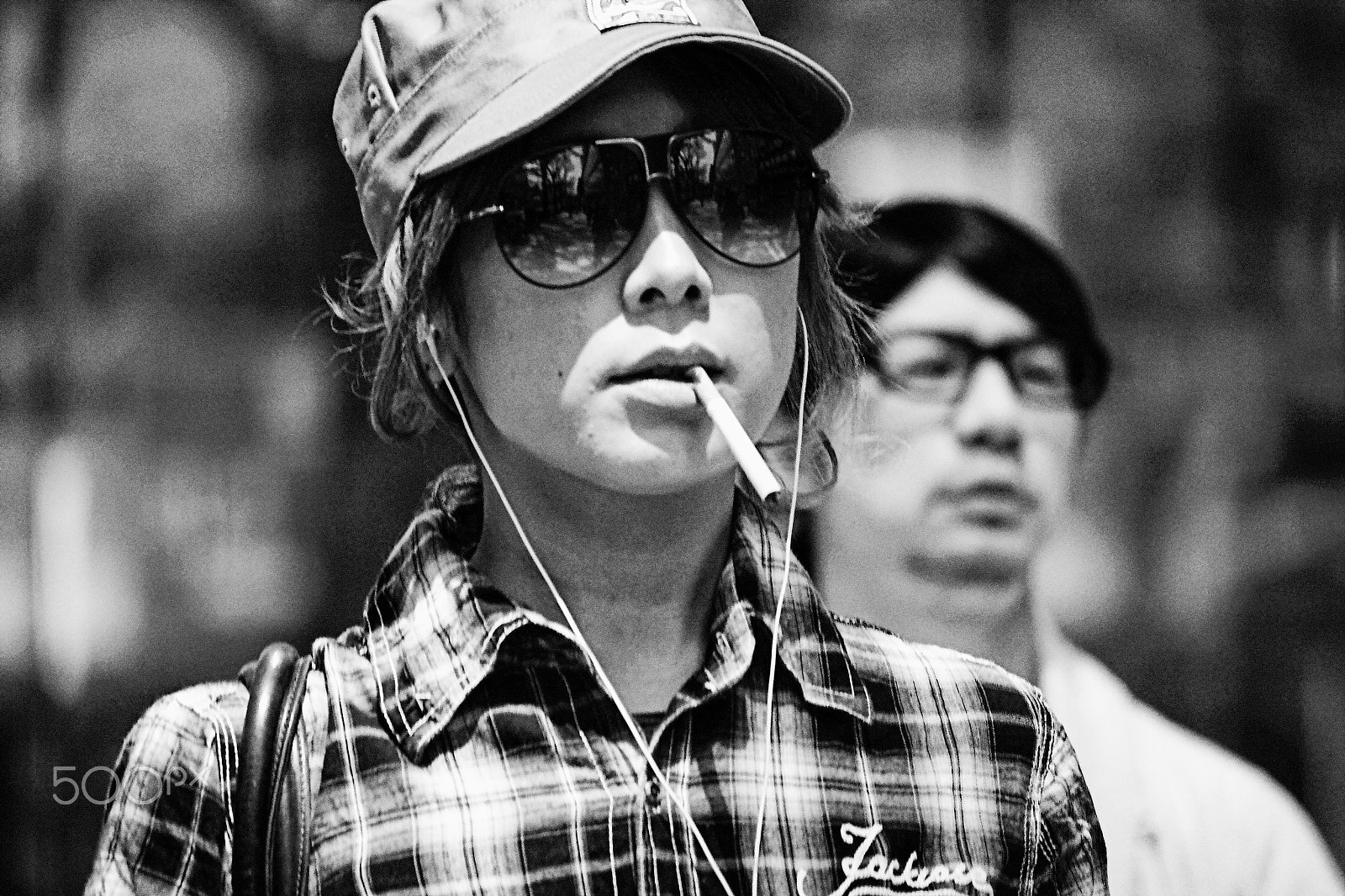 Canon EF-S 55-250mm F4-5.6 IS sample photo. Young man smoking photography