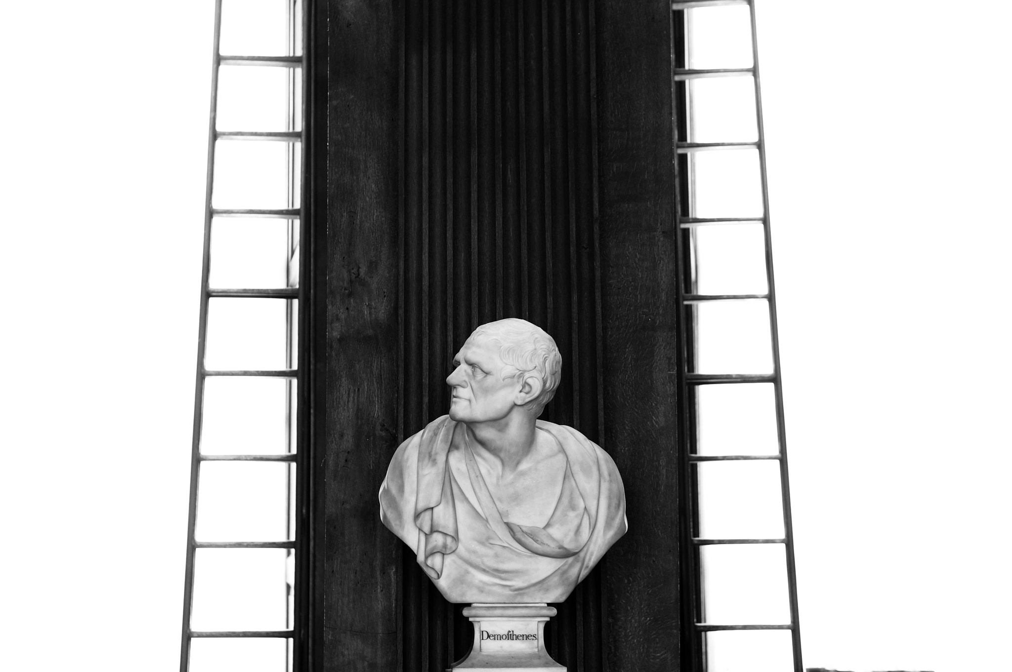 Sony Alpha NEX-5T sample photo. Sculptures inside of the library building. photography