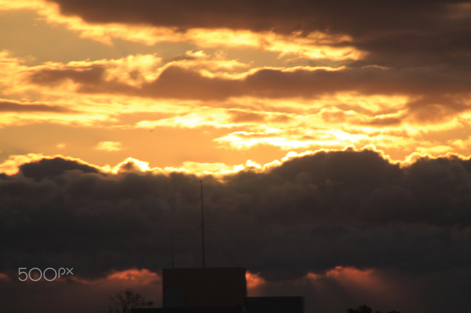 Canon EF 75-300mm f/4-5.6 USM sample photo. Cloudy sunset photography