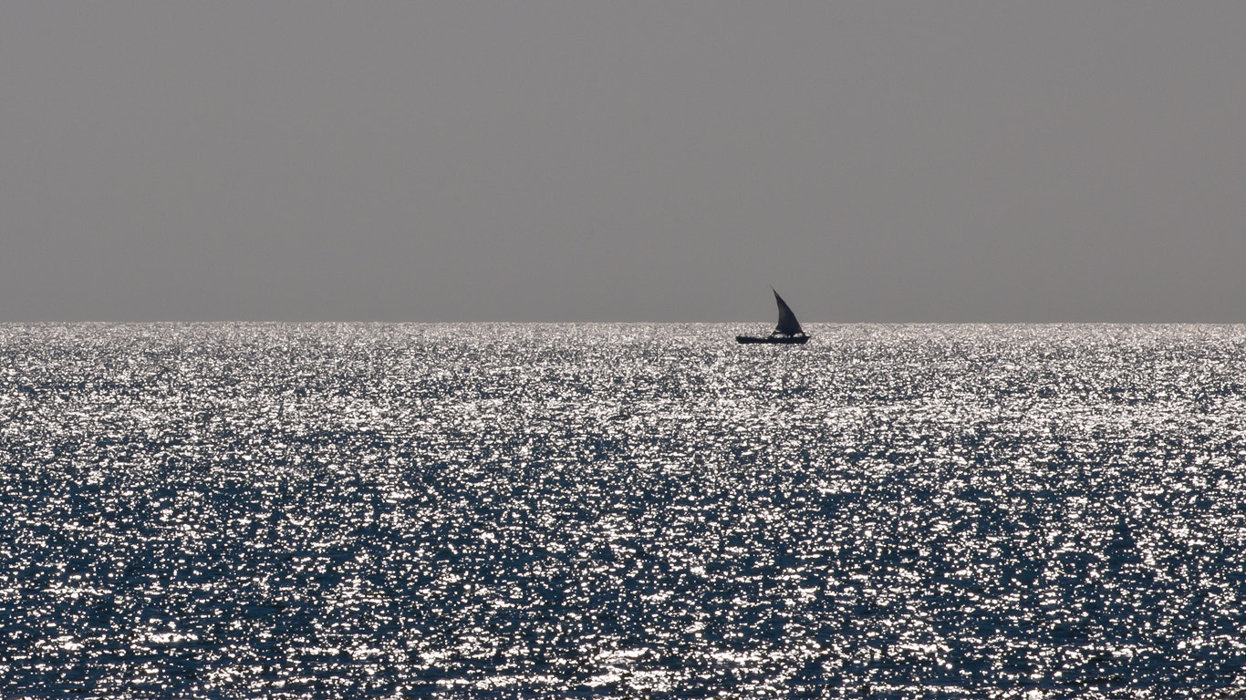 Nikon D3X sample photo. Lonely sail boat photography