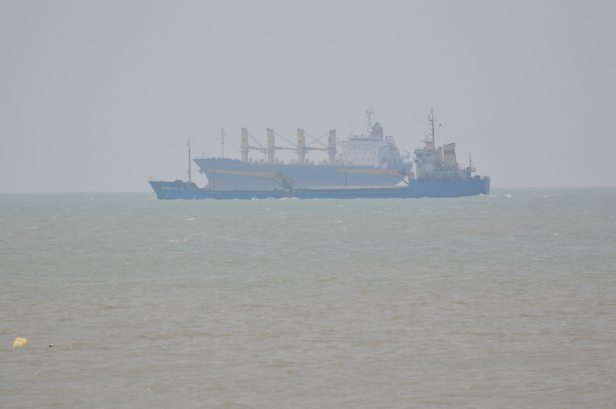 Nikon D3200 sample photo. Hazy day for shipping photography