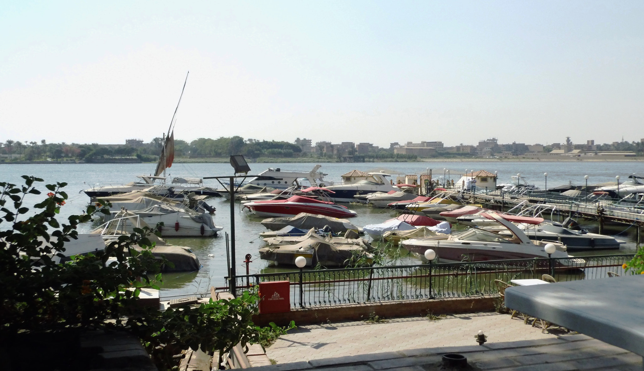 Benq GH700 sample photo. Motorboat harbor on river nile photography