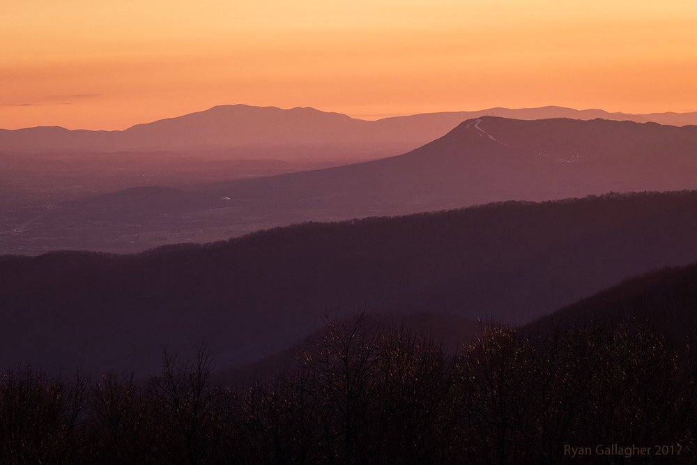 Canon EF-S 55-250mm F4-5.6 IS sample photo. Sunset haze, retreating ridges photography