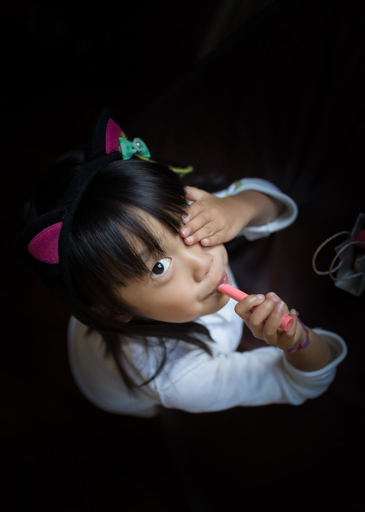 Canon EOS 6D + Canon EF 35mm F1.4L USM sample photo. Got mommy's lip balm photography