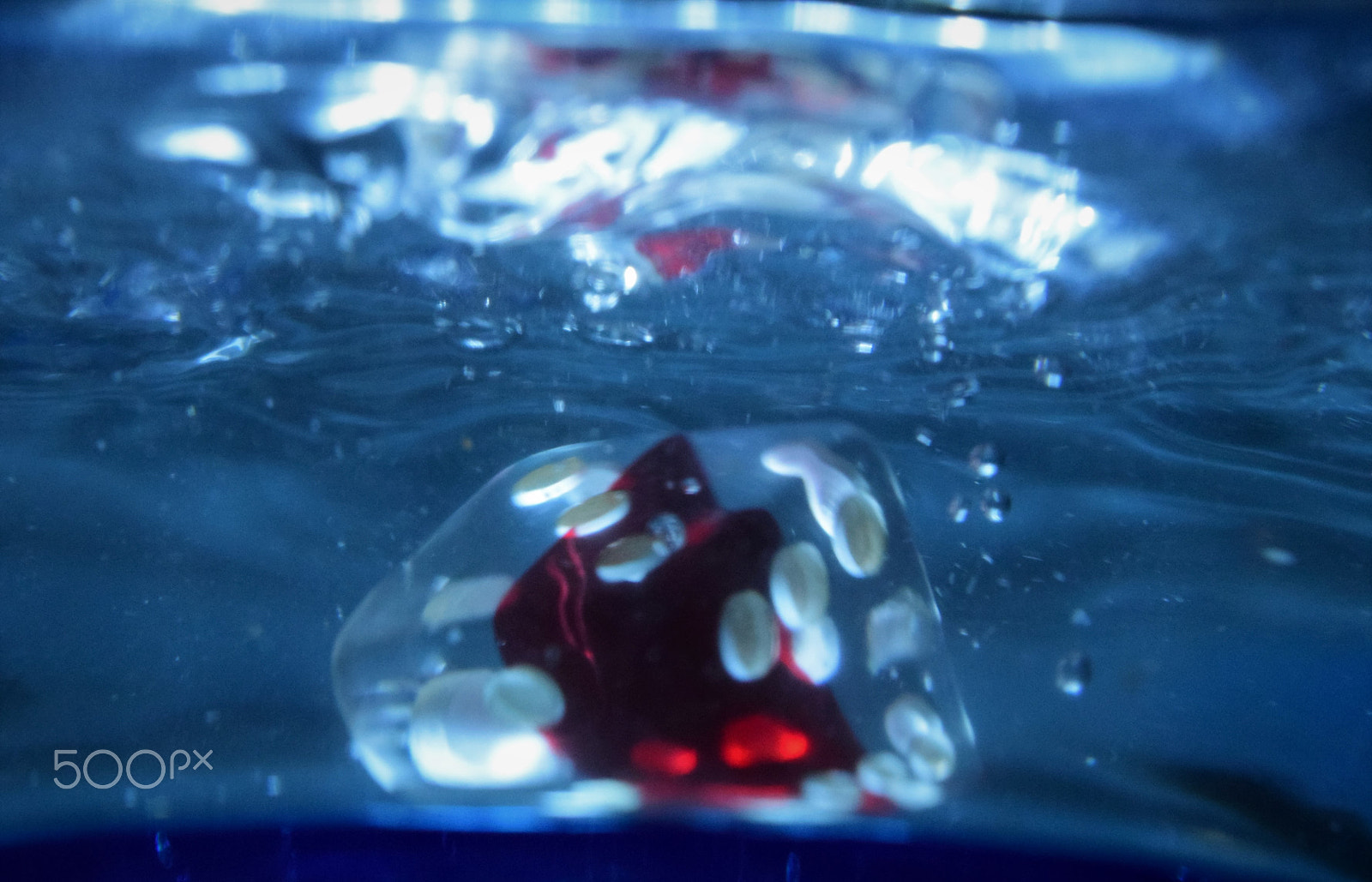 Nikon AF-S DX Micro Nikkor 40mm F2.8 sample photo. Dice and water photography