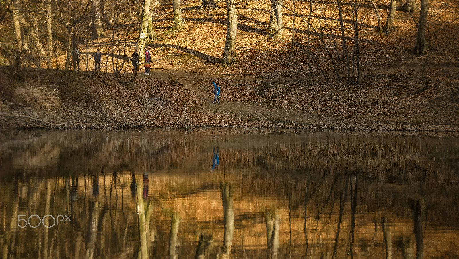 Canon EF 35-80mm f/4-5.6 sample photo. Kid throwing a rock photography