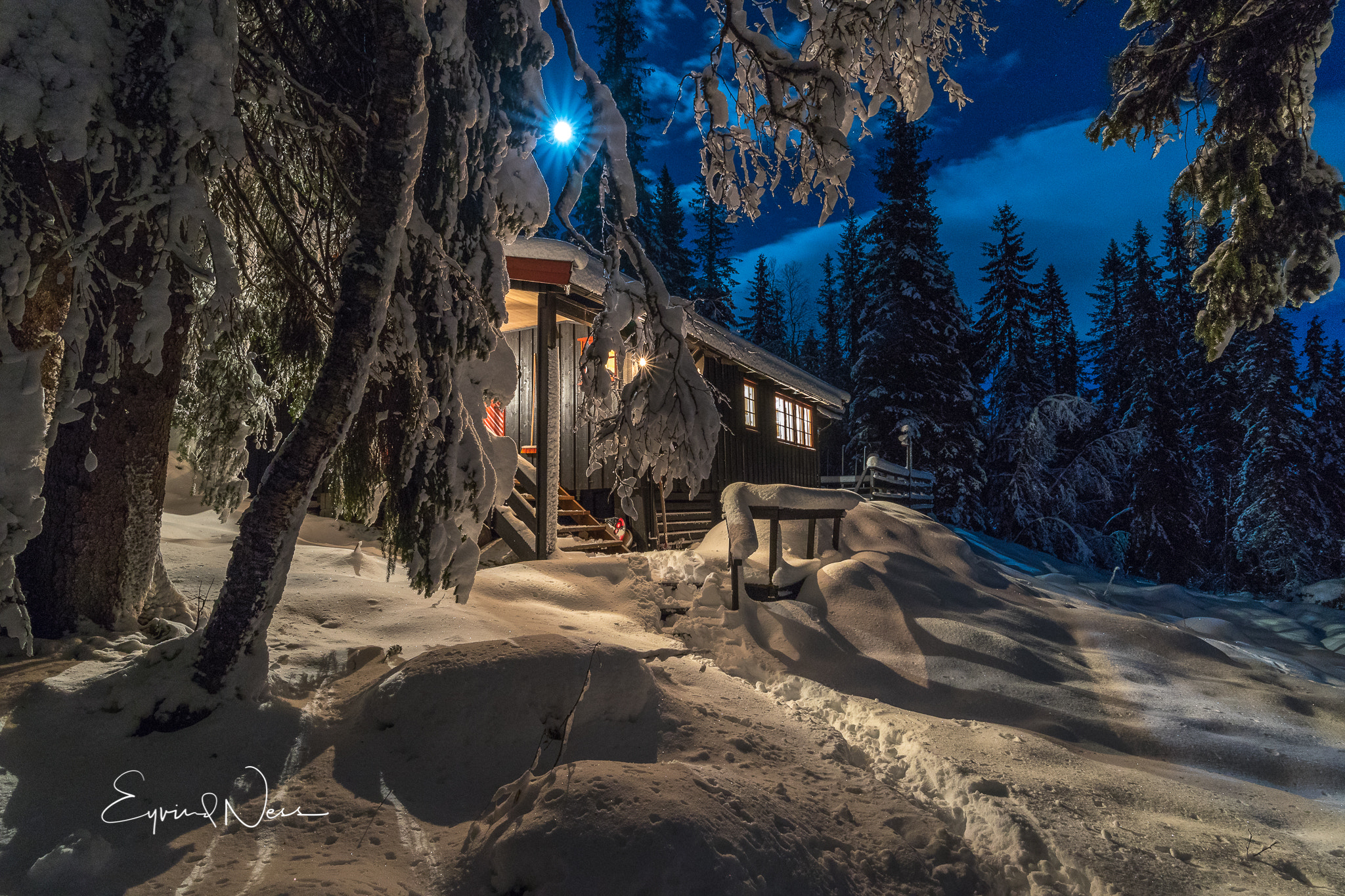 Canon EF 300mm f/2.8L sample photo. Full moon rises above cabin in snowy forest photography