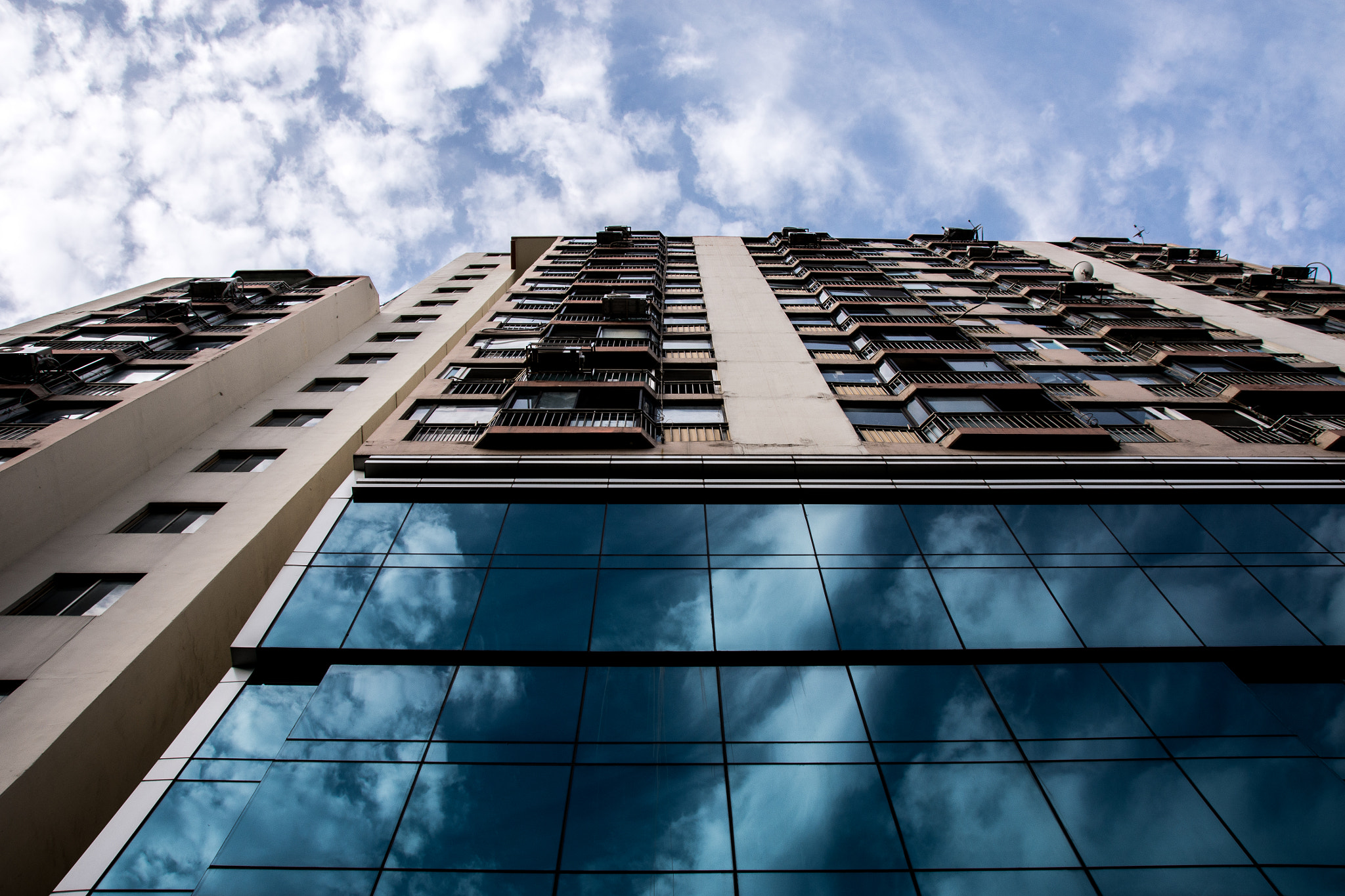 Sigma 18-250mm F3.5-6.3 DC Macro OS HSM sample photo. Clouds on the apartment photography