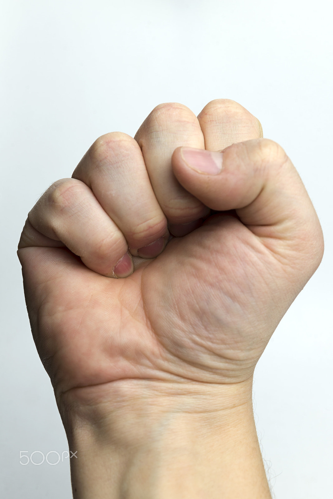 Nikon D600 + Nikon AF Micro-Nikkor 60mm F2.8D sample photo. Fist on a white background. photography