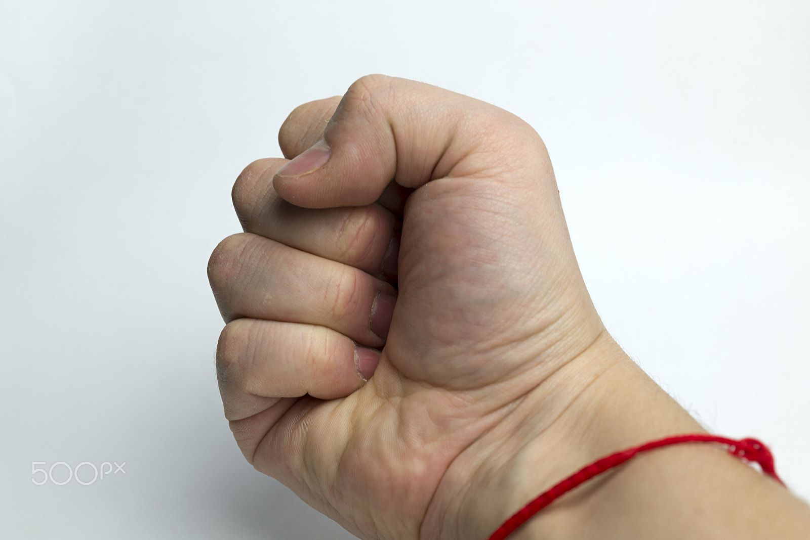 Nikon D600 + Nikon AF Micro-Nikkor 60mm F2.8D sample photo. Fist on a white background. photography