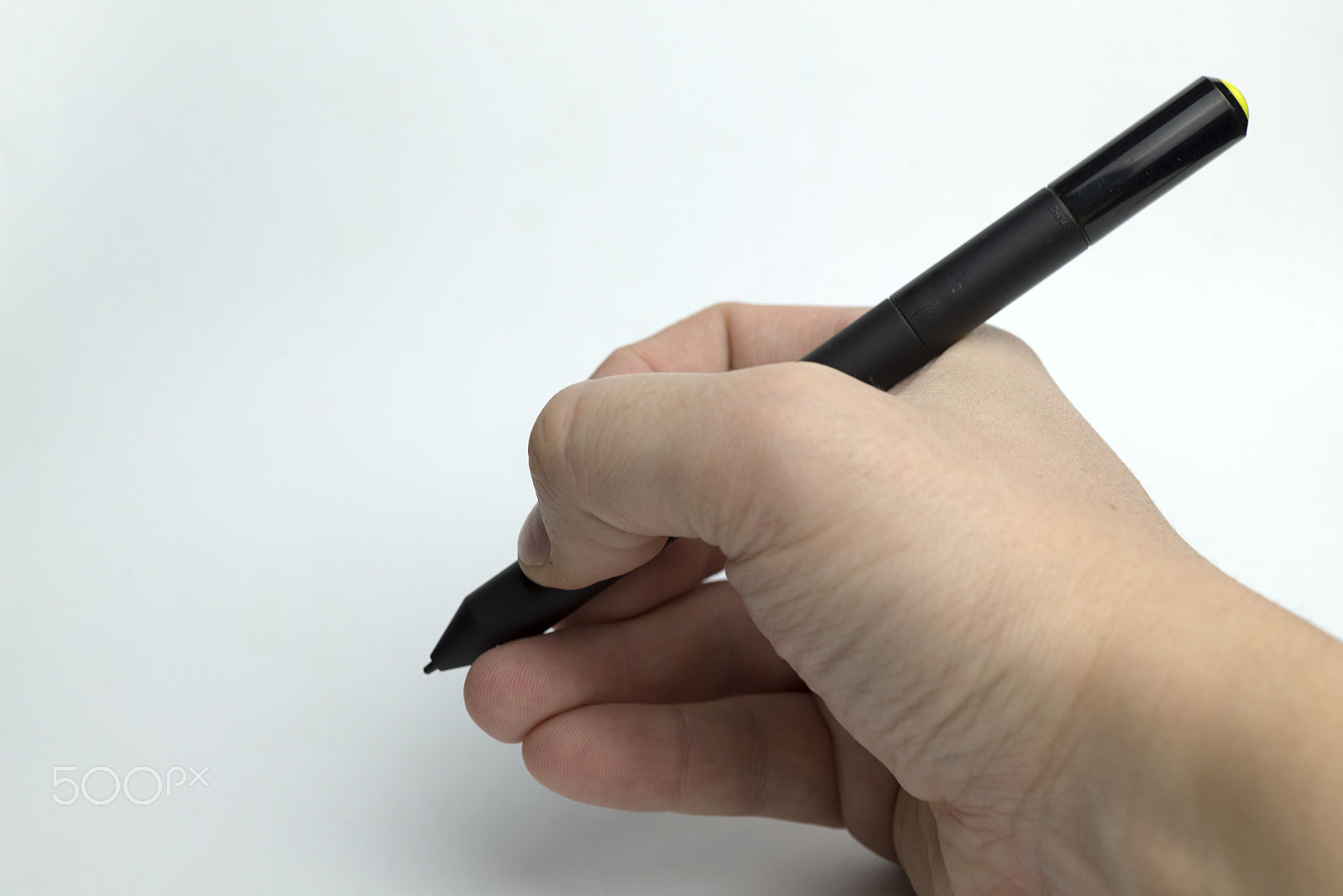 Nikon D600 + Nikon AF Micro-Nikkor 60mm F2.8D sample photo. Hand on a white background holding a pencil. photography