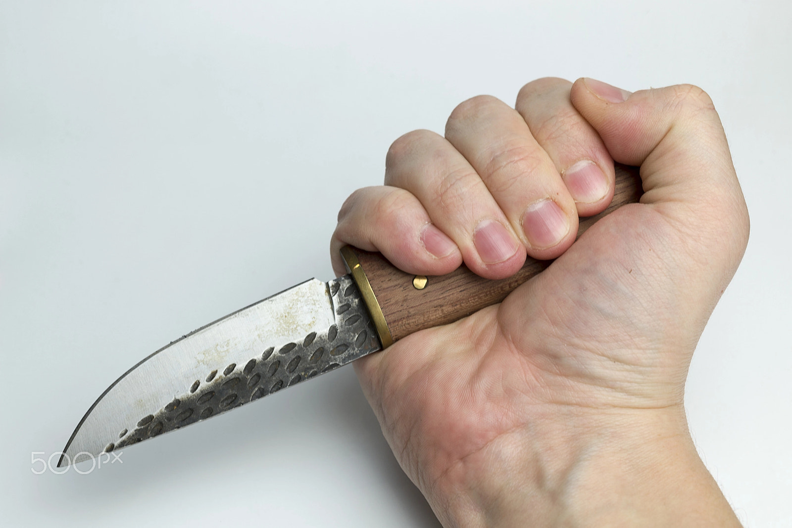 Nikon D600 + Nikon AF Micro-Nikkor 60mm F2.8D sample photo. Hand on a white background holding a knife. photography