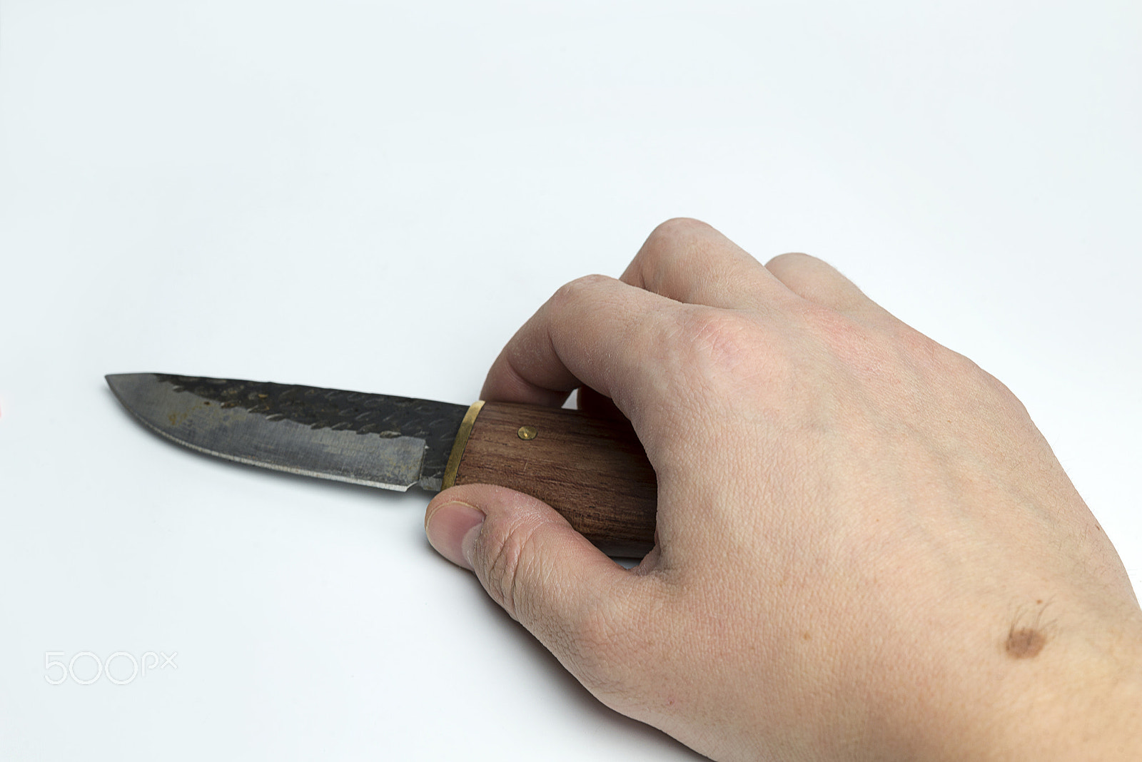 Nikon D600 + Nikon AF Micro-Nikkor 60mm F2.8D sample photo. Hand on a white background holding a knife. photography