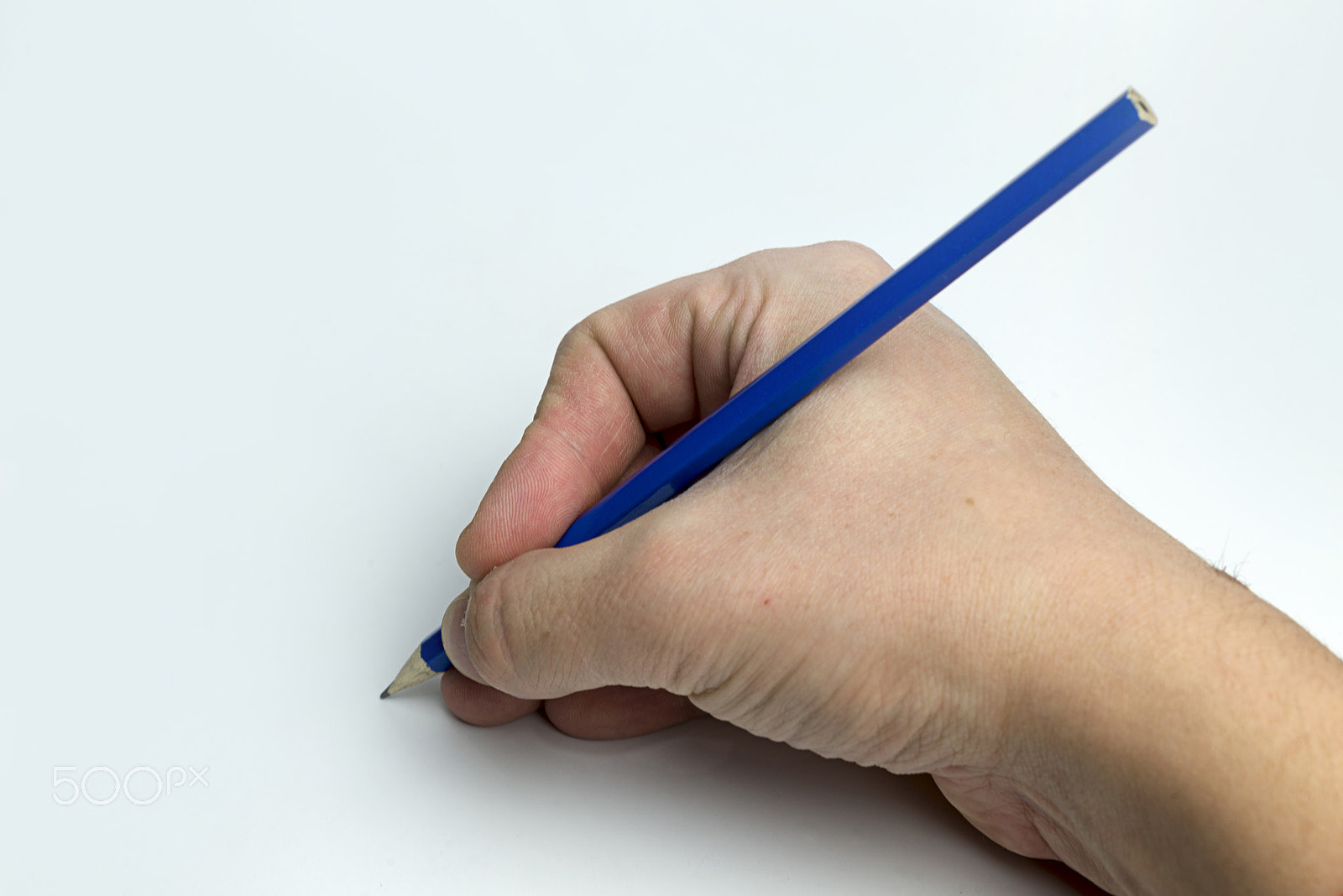 Nikon D600 + Nikon AF Micro-Nikkor 60mm F2.8D sample photo. Hand on a white background holding a pencil. photography