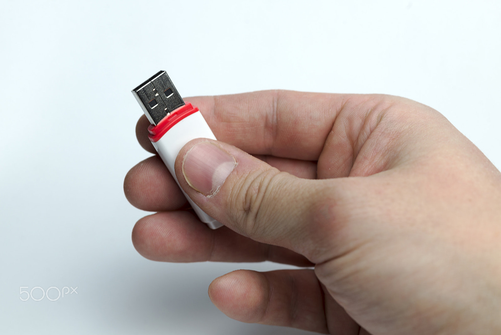 Nikon D600 + Nikon AF Micro-Nikkor 60mm F2.8D sample photo. Hand on a white background holding a stick. photography