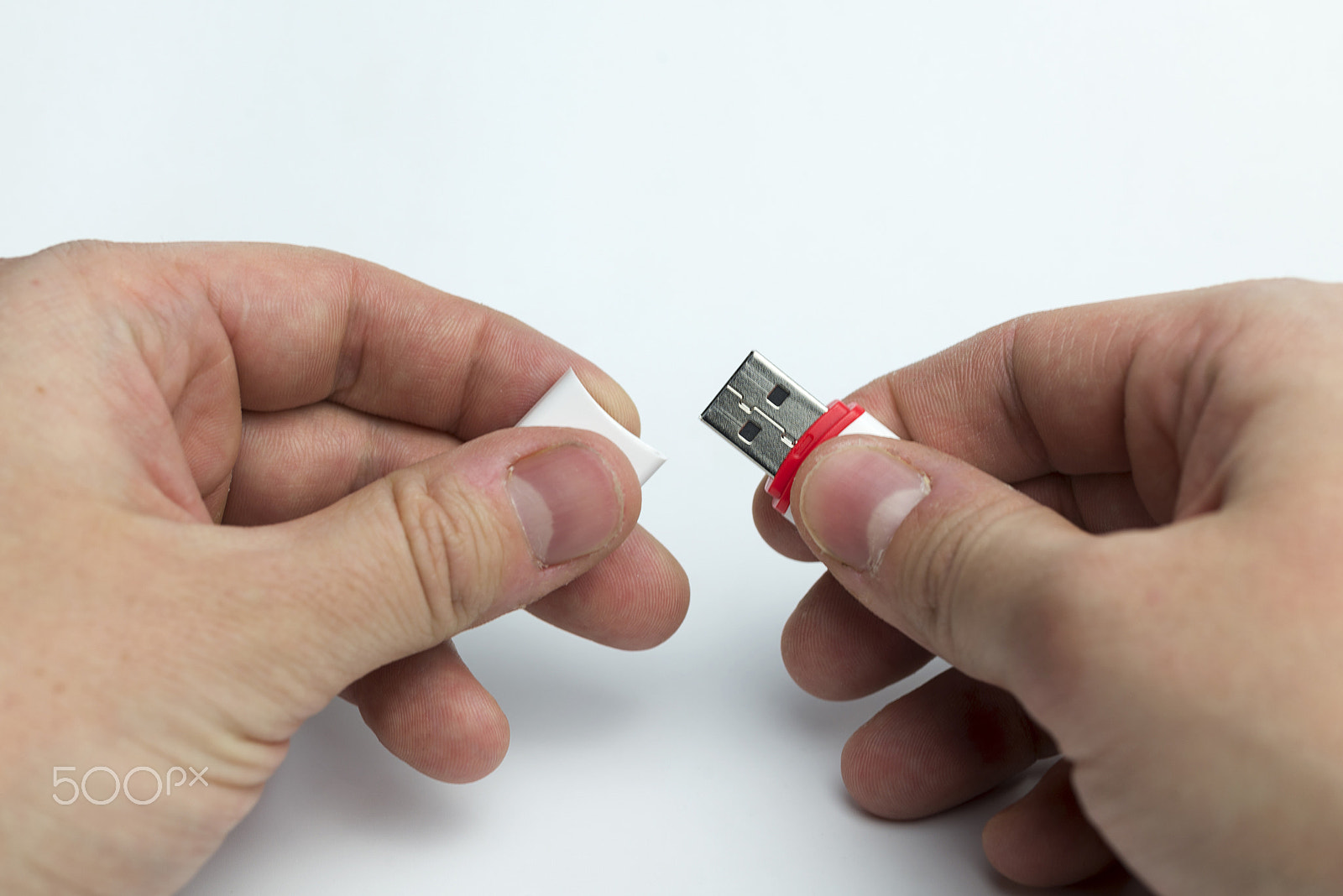 Nikon D600 + Nikon AF Micro-Nikkor 60mm F2.8D sample photo. Hand on a white background holding a stick. photography