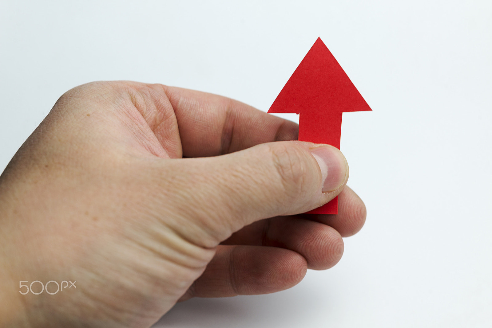 Nikon D600 + Nikon AF Micro-Nikkor 60mm F2.8D sample photo. Hands holding up a red arrow. photography