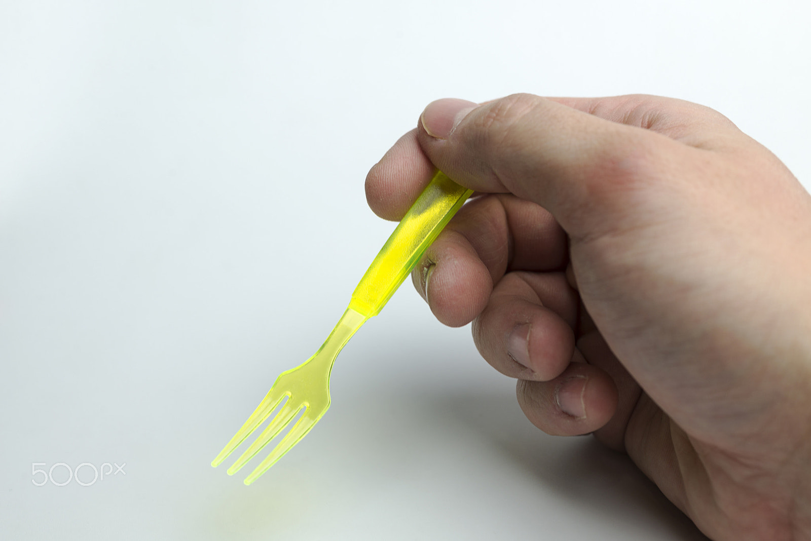 Nikon D600 + Nikon AF Micro-Nikkor 60mm F2.8D sample photo. Hand holding a plastic fork. photography