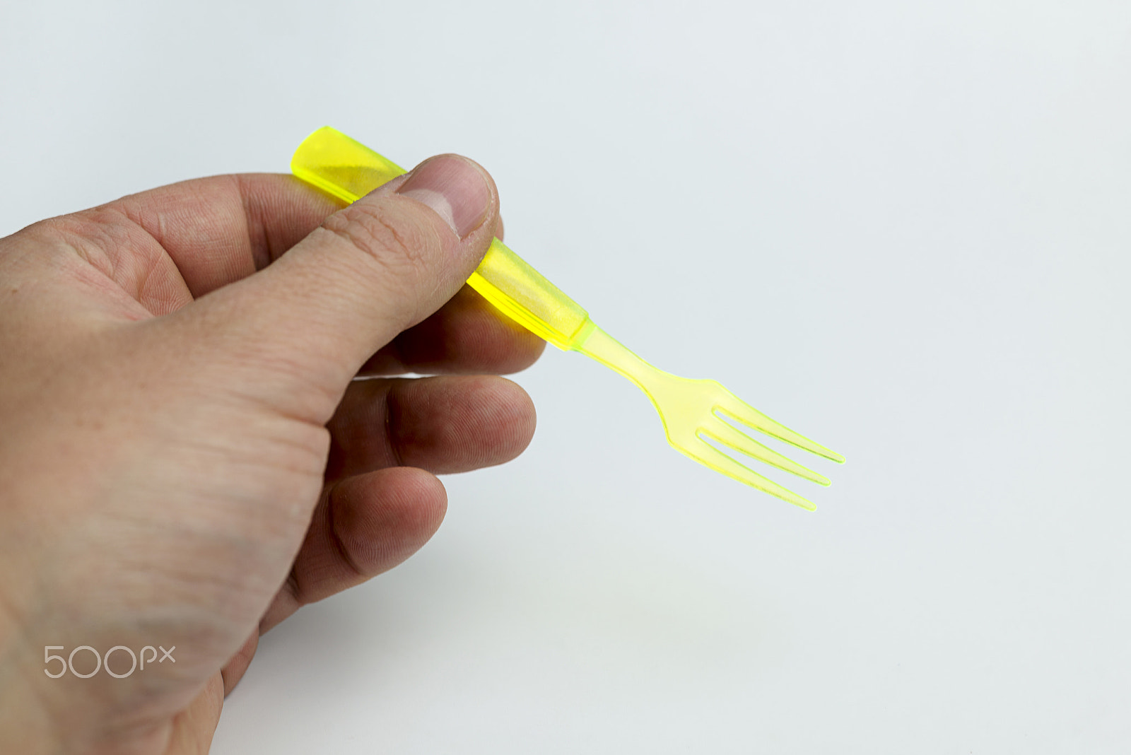 Nikon D600 + Nikon AF Micro-Nikkor 60mm F2.8D sample photo. Hand holding a plastic fork. photography