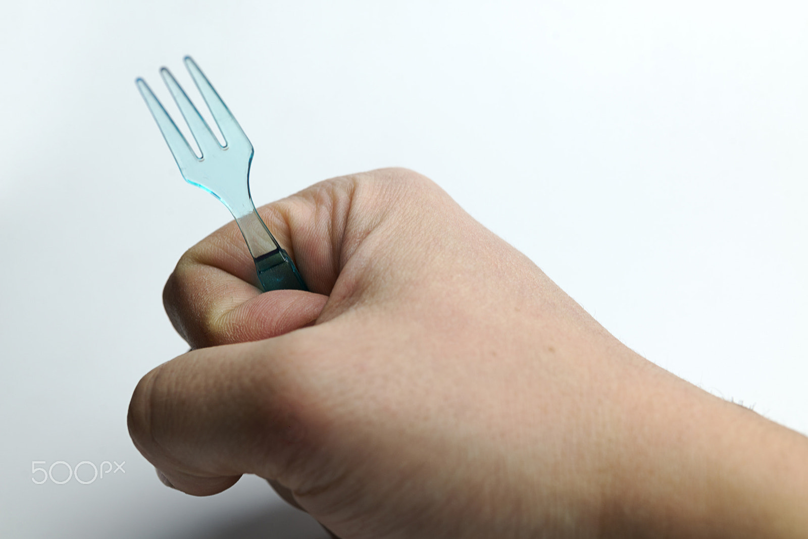 Nikon D600 + Nikon AF Micro-Nikkor 60mm F2.8D sample photo. Hand holding a plastic fork. photography