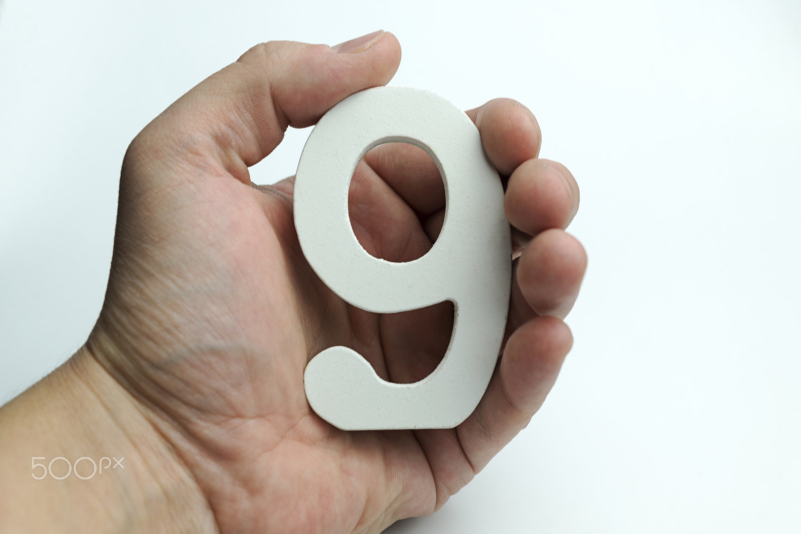 Nikon AF Micro-Nikkor 60mm F2.8D sample photo. Hand holding number nine. photography