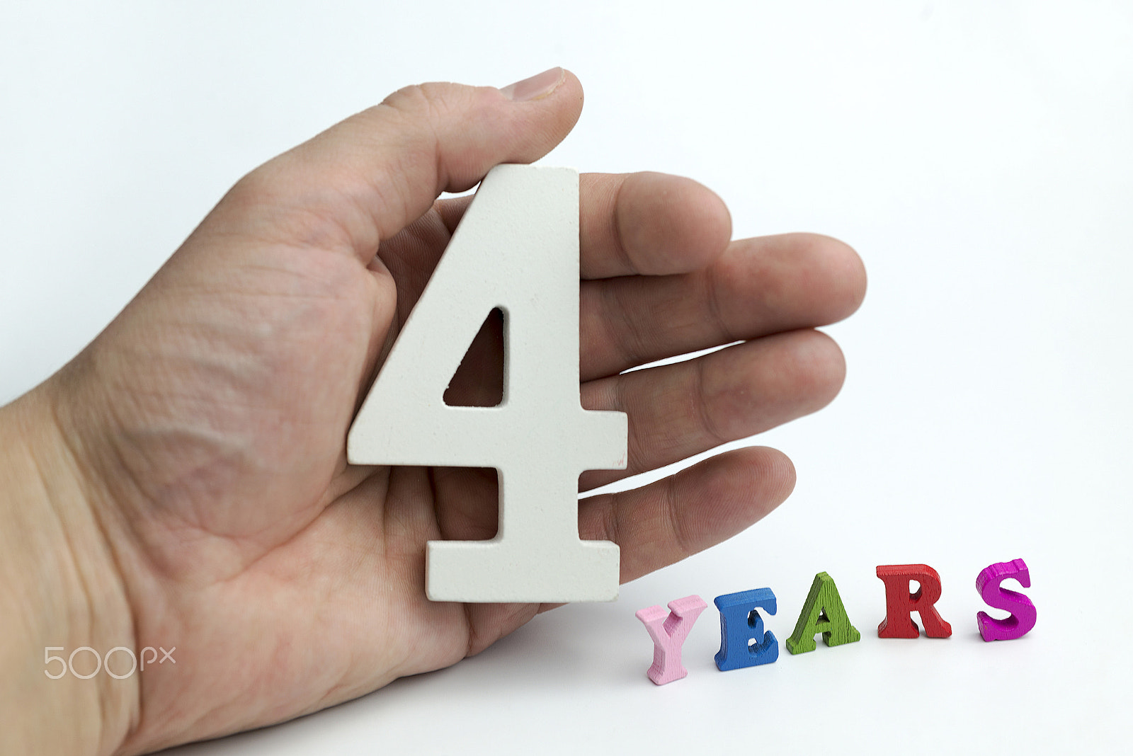 Nikon AF Micro-Nikkor 60mm F2.8D sample photo. Hands holding number four. photography