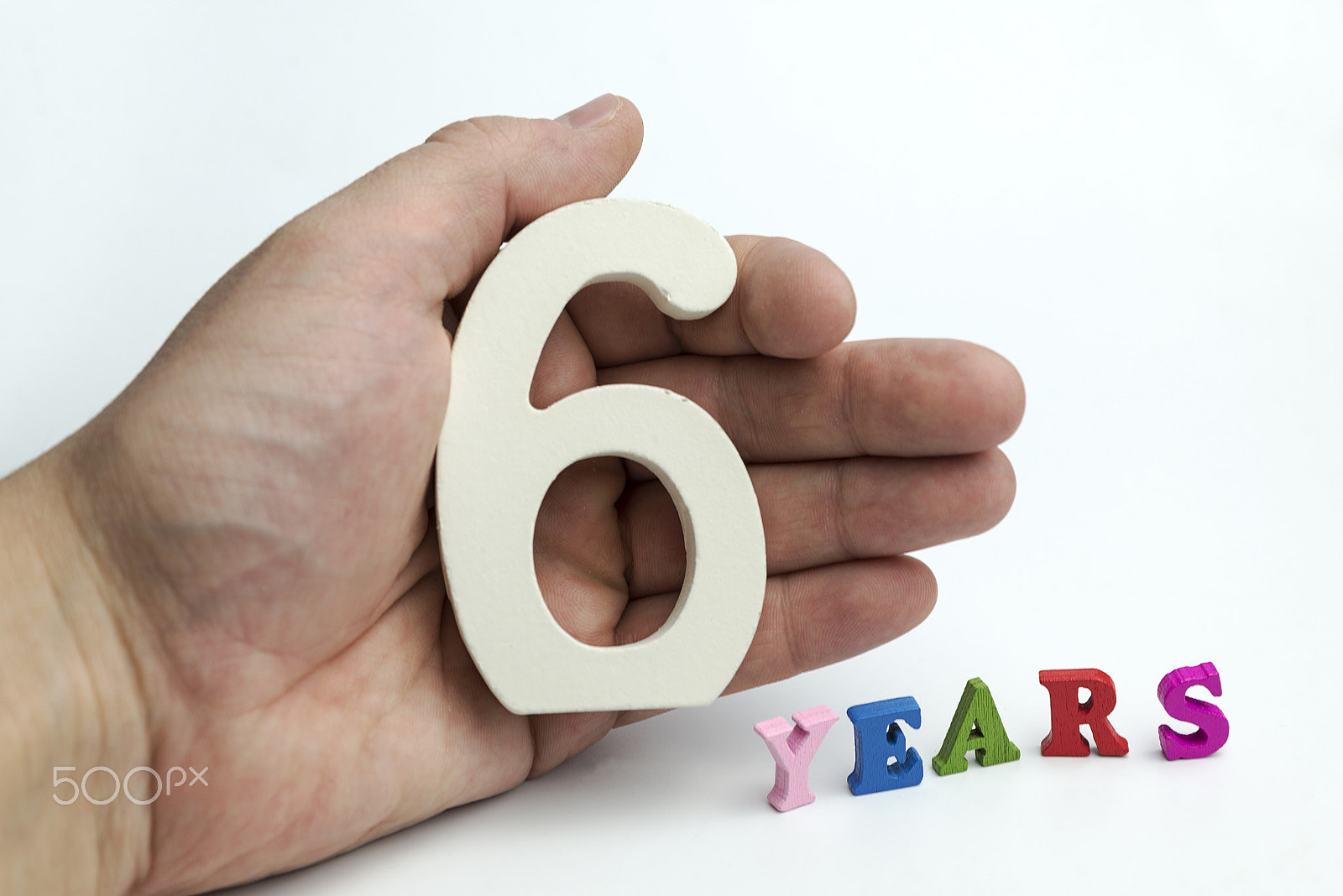Nikon AF Micro-Nikkor 60mm F2.8D sample photo. Hand holding number six. photography