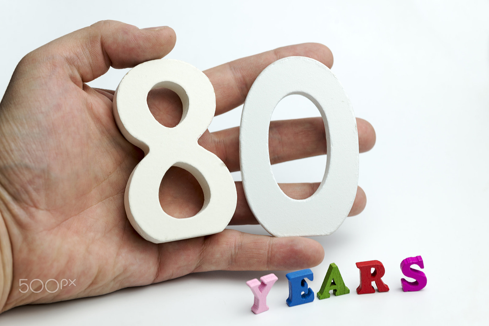 Nikon D600 + Nikon AF Micro-Nikkor 60mm F2.8D sample photo. Hand holding number eighty. photography