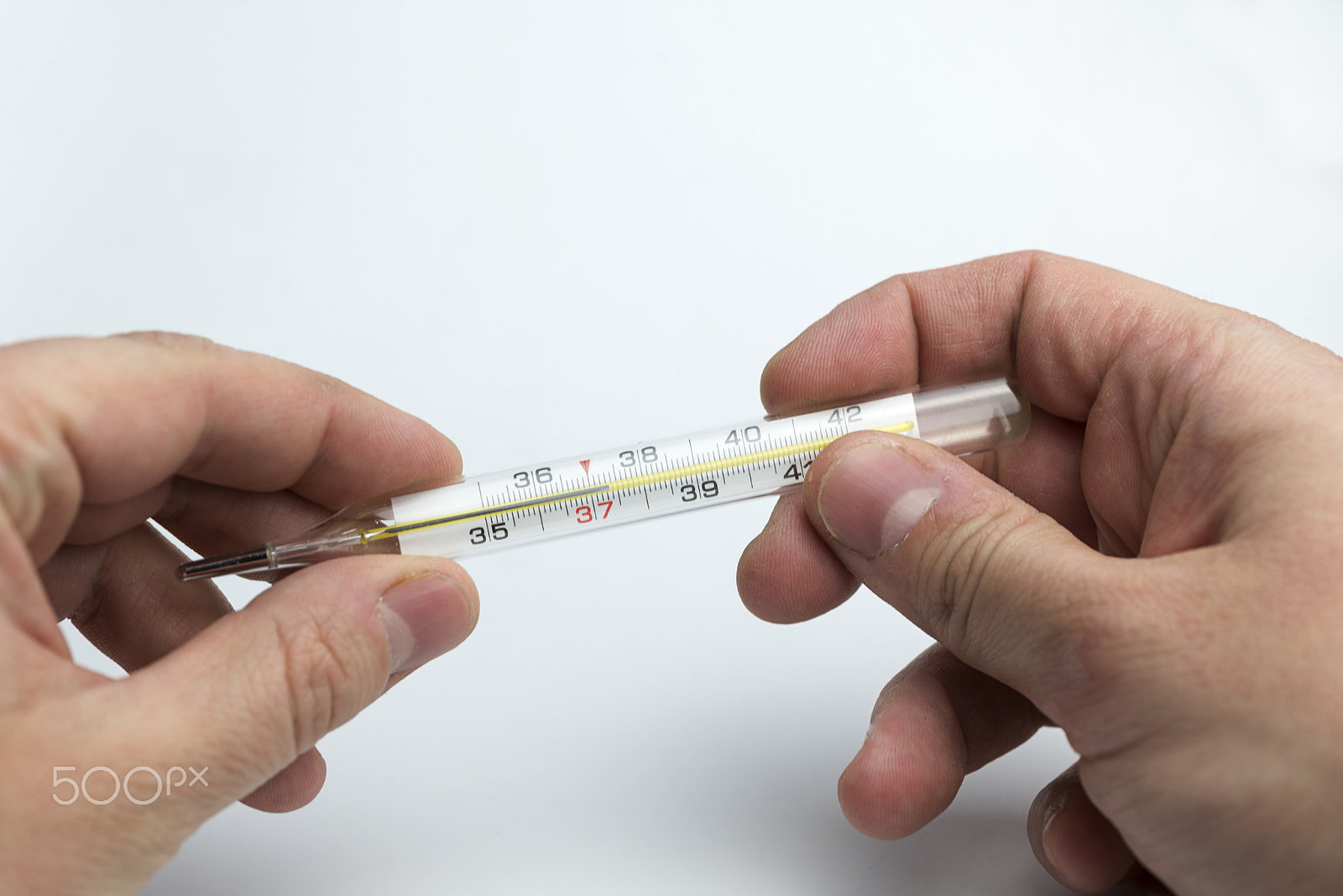 Nikon D600 + Nikon AF Micro-Nikkor 60mm F2.8D sample photo. Hand holds a thermometer. photography