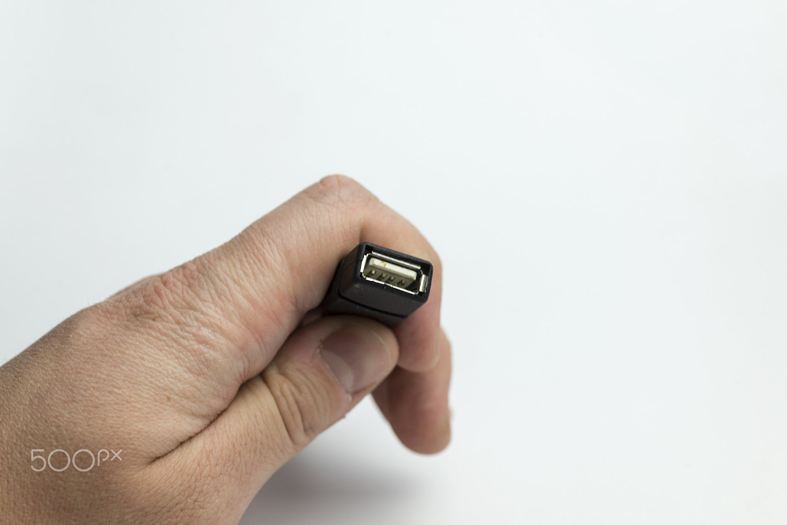 Nikon D600 + Nikon AF Micro-Nikkor 60mm F2.8D sample photo. Hand holds usb cable photography