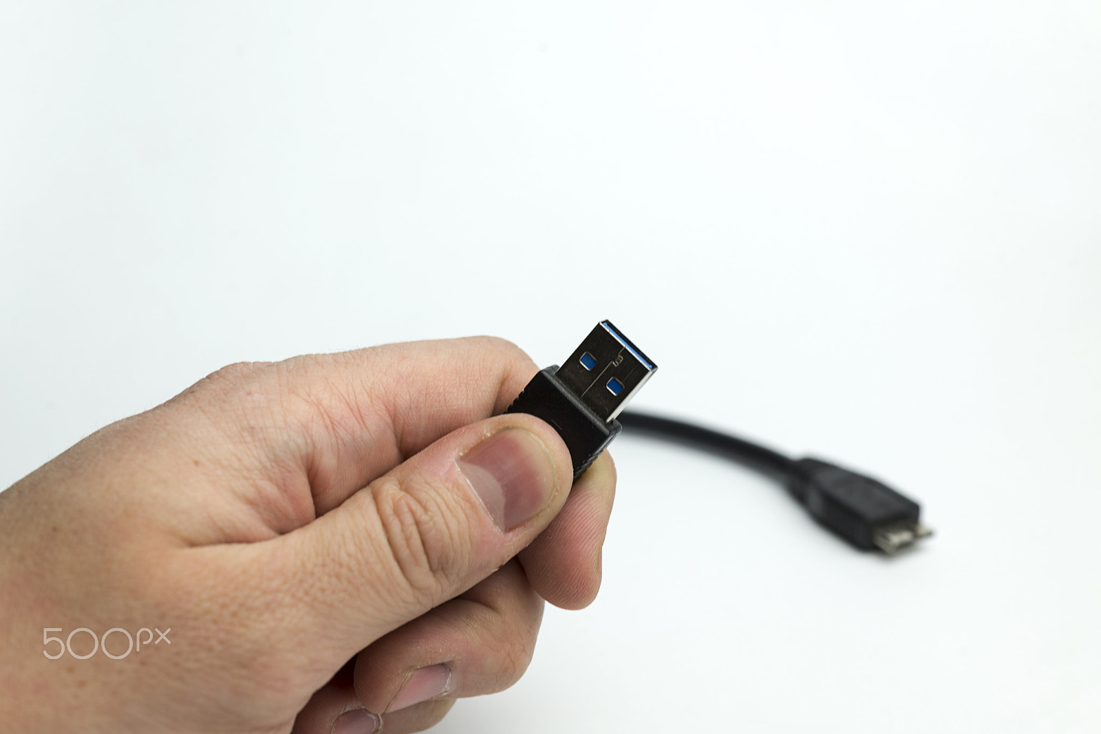 Nikon D600 + Nikon AF Micro-Nikkor 60mm F2.8D sample photo. Hand holds usb cable photography