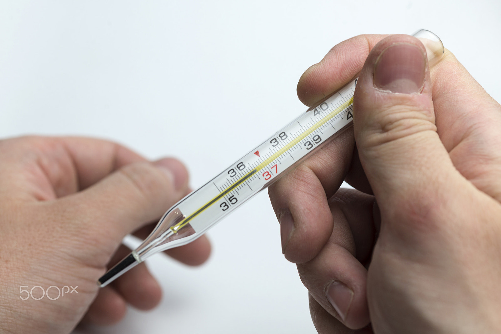 Nikon D600 + Nikon AF Micro-Nikkor 60mm F2.8D sample photo. Hand holds a thermometer. photography