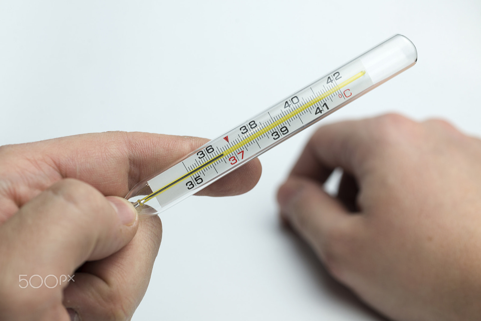 Nikon D600 + Nikon AF Micro-Nikkor 60mm F2.8D sample photo. Hand holds a thermometer. photography