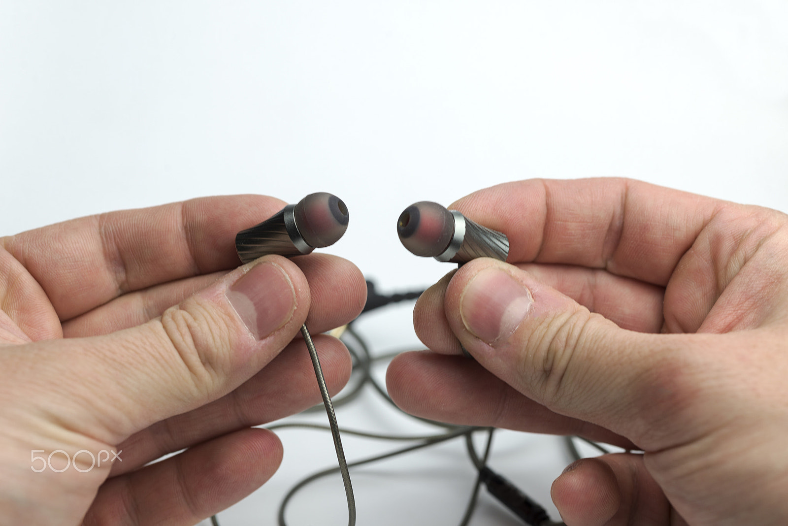Nikon D600 + Nikon AF Micro-Nikkor 60mm F2.8D sample photo. Hands holding headphones. photography