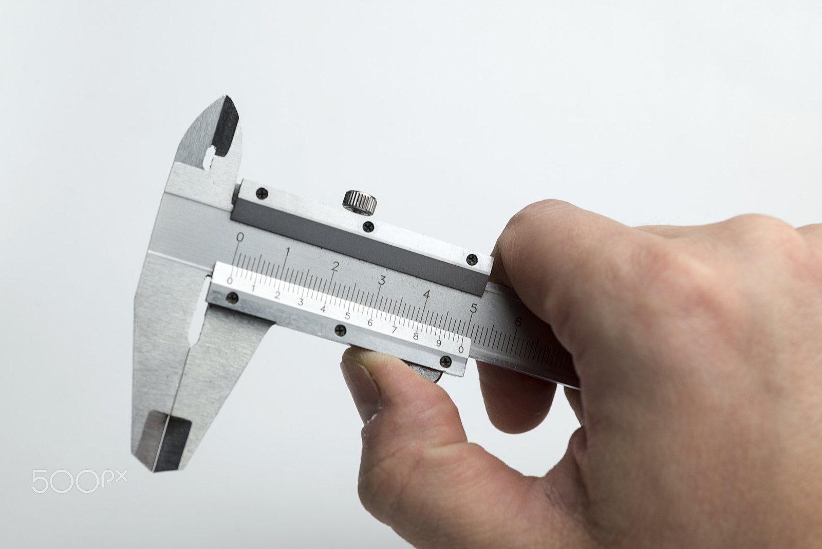 Nikon D600 + Nikon AF Micro-Nikkor 60mm F2.8D sample photo. Hand holding caliper photography