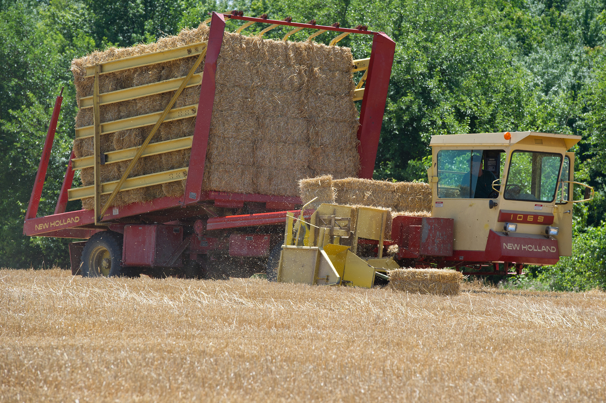 Nikon D3S sample photo. Hay baler operating in field photography