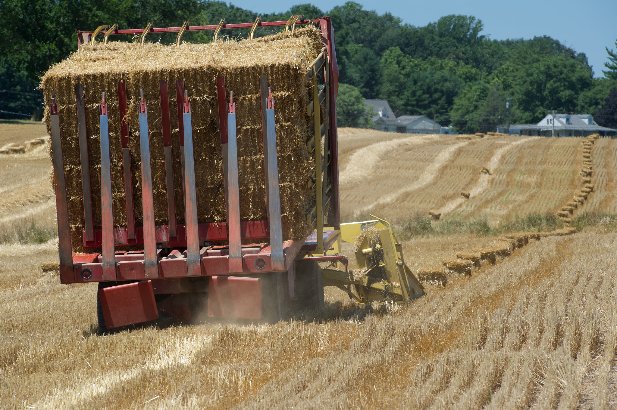 Nikon D3S sample photo. Hay baler operating in field photography