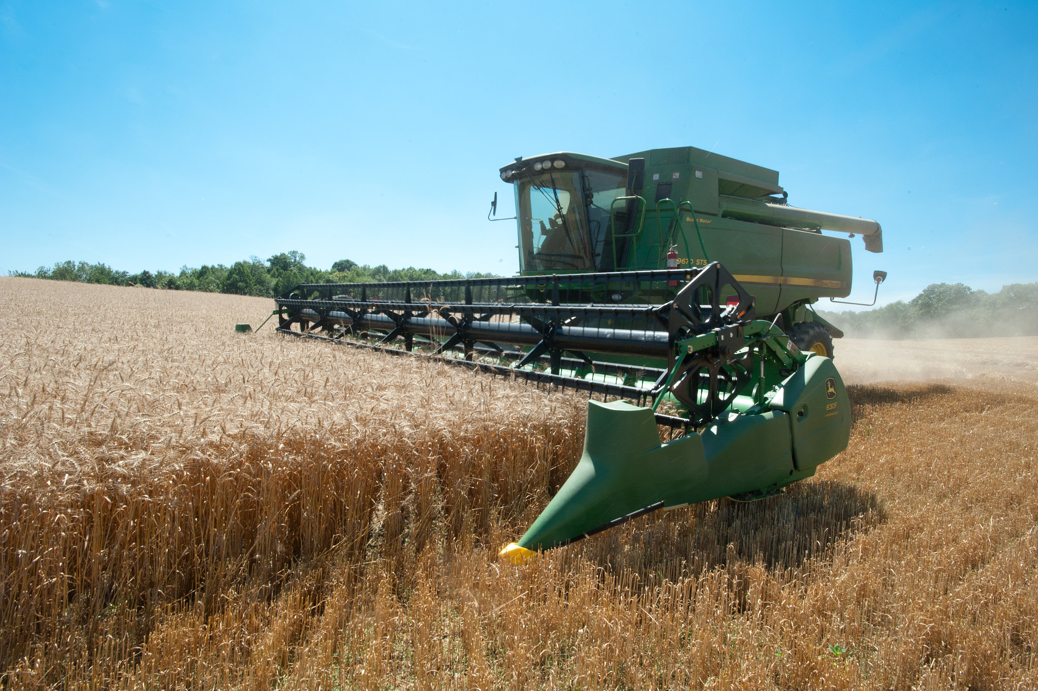 Nikon AF-S Nikkor 17-35mm F2.8D ED-IF sample photo. Combine harvesting grain photography