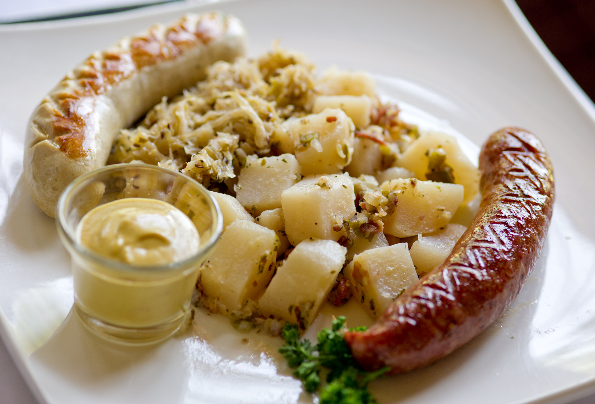 Nikon D3S sample photo. German sauerkraut, with seasoned potatoes, specialty mustard photography