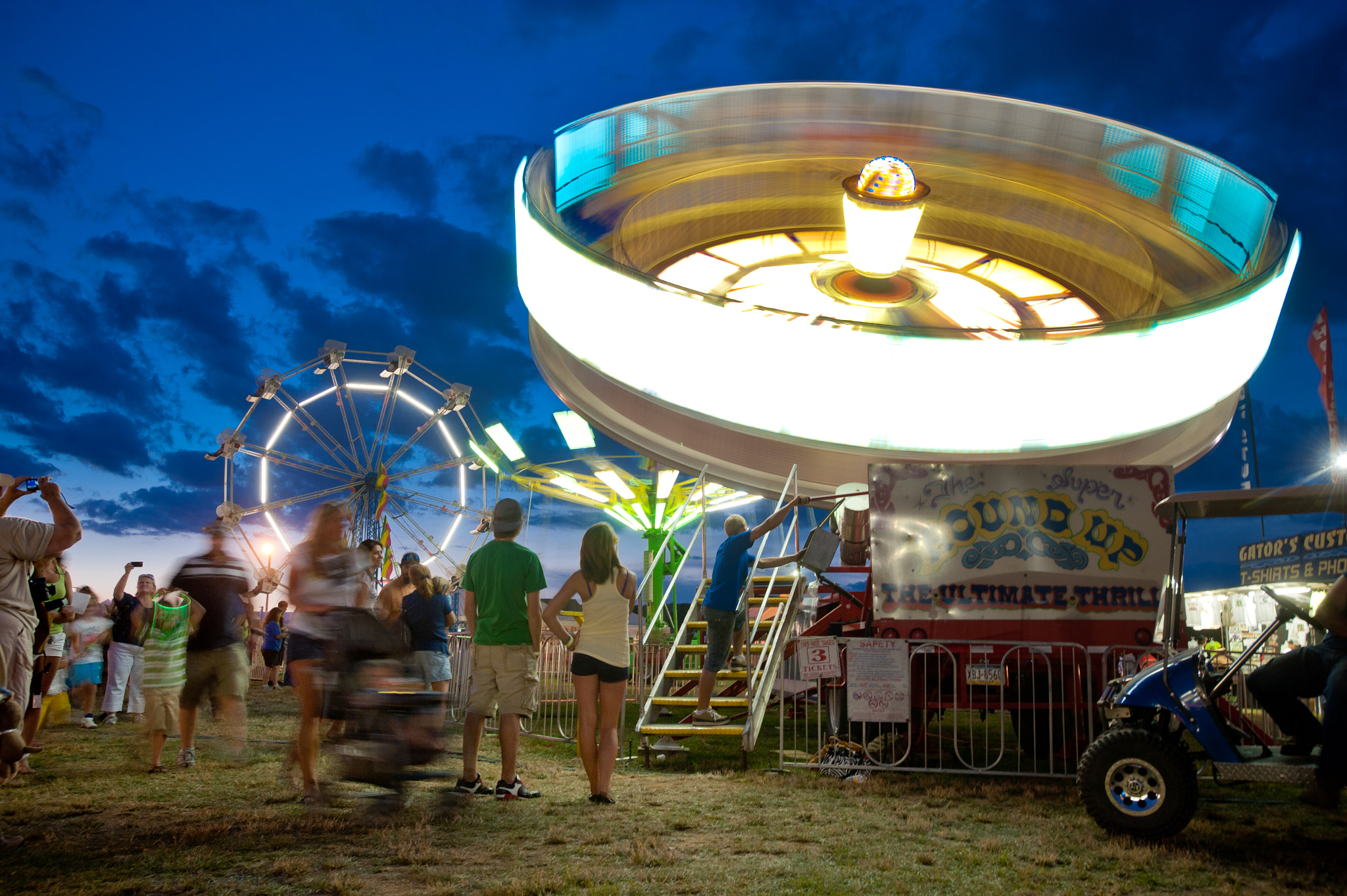 Nikon D700 + Nikon AF-S Nikkor 17-35mm F2.8D ED-IF sample photo. Lights in motion of ride at the mason dixon fair carnival photography