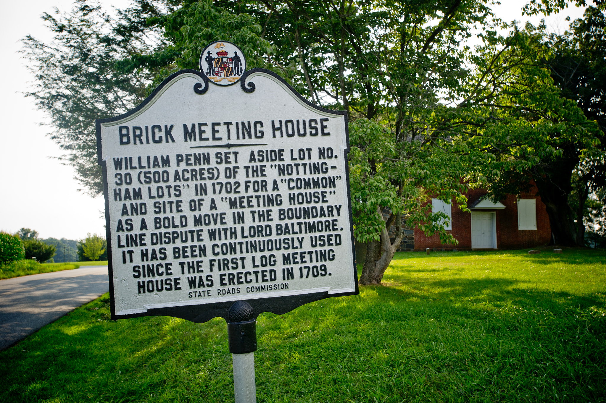 Nikon AF-S Nikkor 17-35mm F2.8D ED-IF sample photo. Mason dixon line signage of brick meeting house, cecil county photography