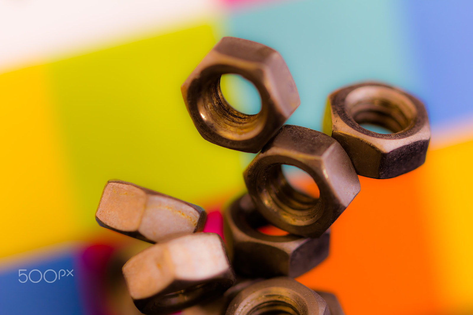 Canon EF 100mm F2.8L Macro IS USM sample photo. Nuts in front of colour photography