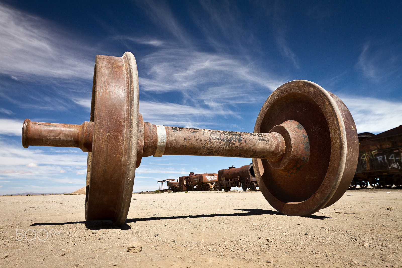 Canon EOS 7D + Canon EF 16-35mm F2.8L II USM sample photo. Rusted train wheels in uyuni train cemetery photography