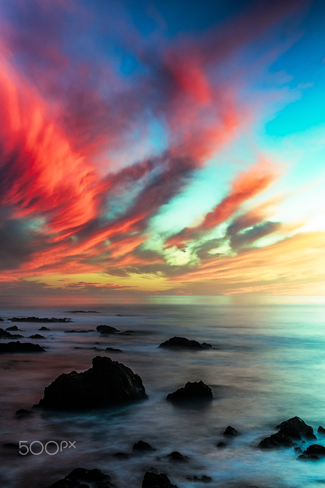 Sigma 30mm F1.4 EX DC HSM sample photo. Dramatic sky over a moody ocean bay at sunset photography