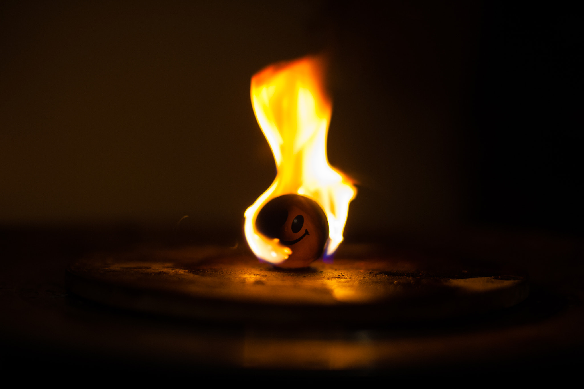 Nikon D700 + Nikon AF Nikkor 50mm F1.4D sample photo. Smile through the flame photography