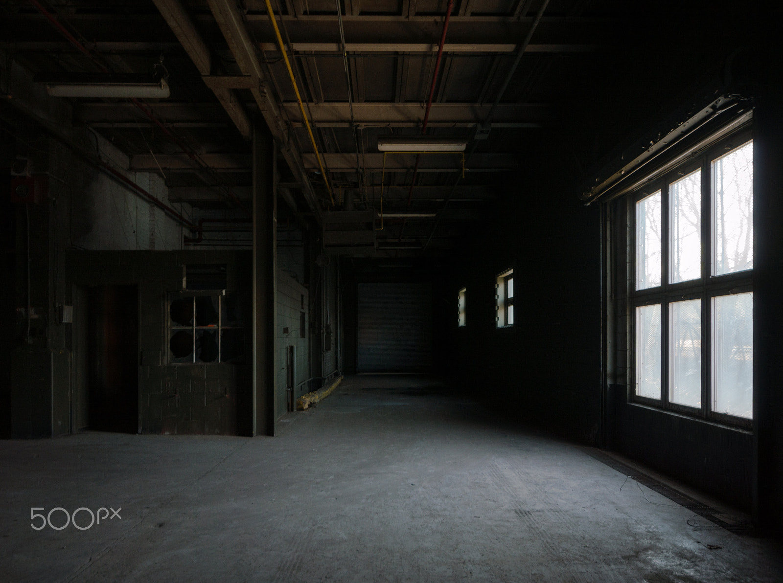 Nikon D3200 + Sigma 10-20mm F4-5.6 EX DC HSM sample photo. Abandoned industrial building light photography