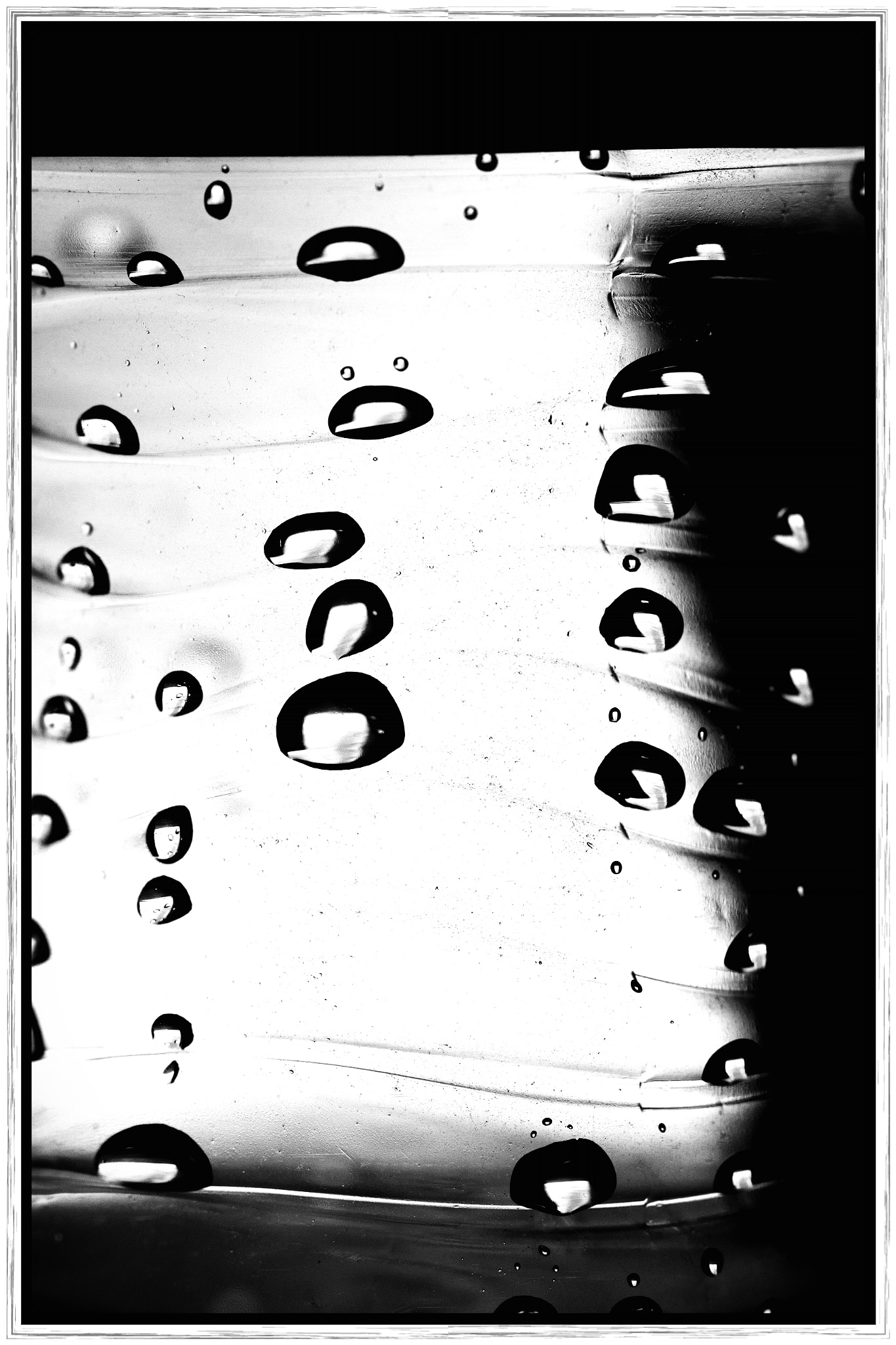 Canon EF 100mm F2.8L Macro IS USM sample photo. Water drops on plastic photography