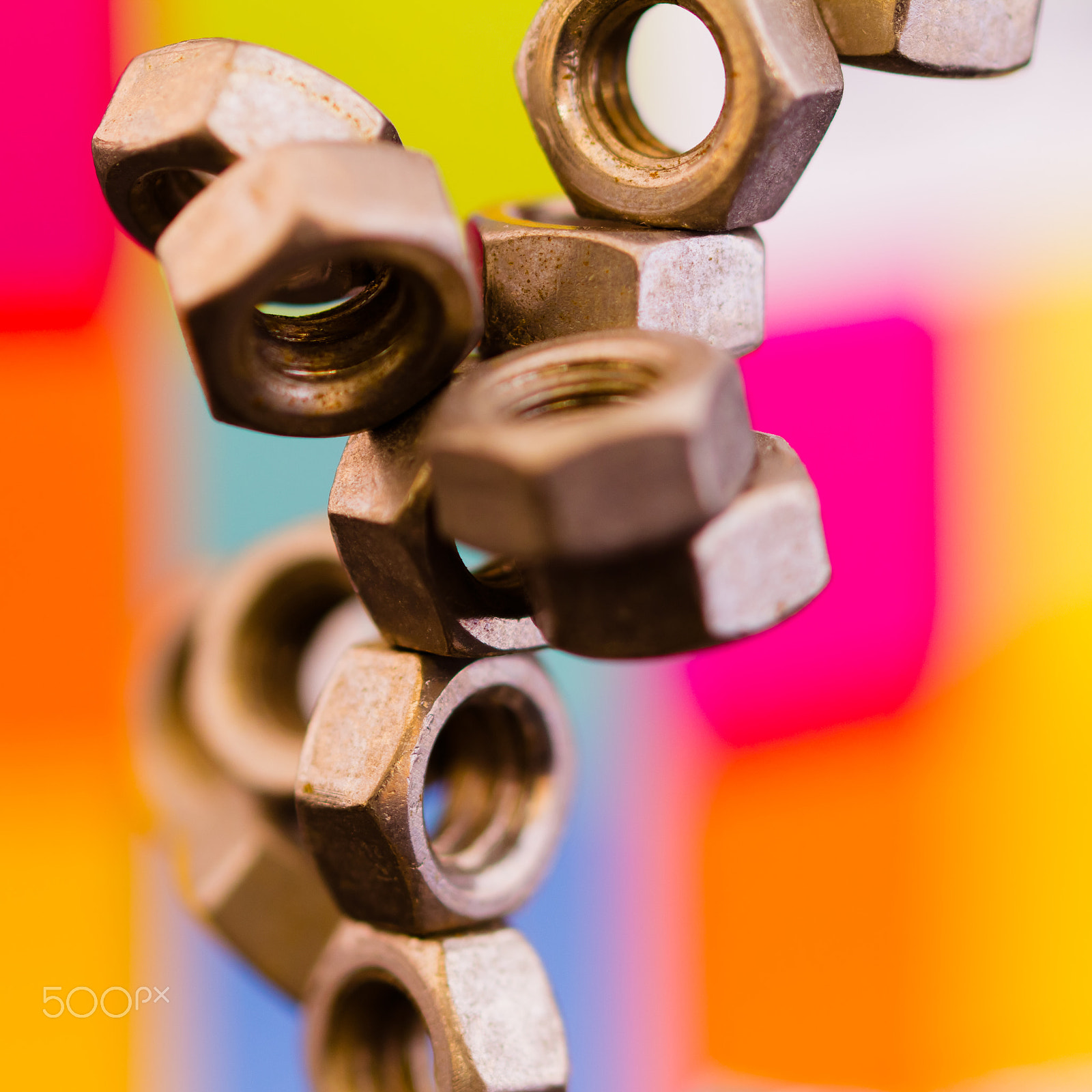 Canon EF 100mm F2.8L Macro IS USM sample photo. Nuts in front of colours #2 photography