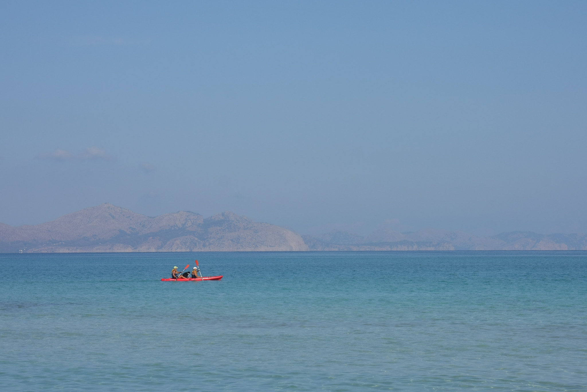 Canon EF-S 17-85mm F4-5.6 IS USM sample photo. Red kayak photography