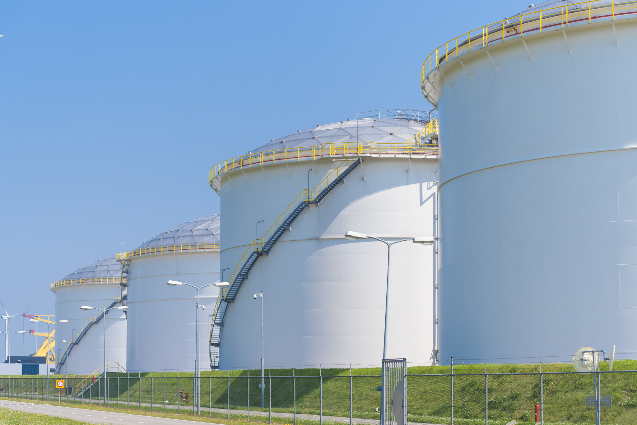 Pentax K-1 + Tamron SP AF 70-200mm F2.8 Di LD (IF) MACRO sample photo. Oil storage in the port of amsterdam photography